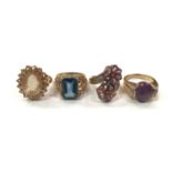 Four 9ct gold multi-gem set cocktail rings