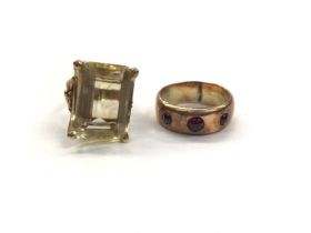1970s 9ct gold citrine cocktail ring and a 1920s 9ct rose gold ring set with three red cabochons (2)