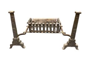 Two pairs of fire dogs of large size with grates in antique manner