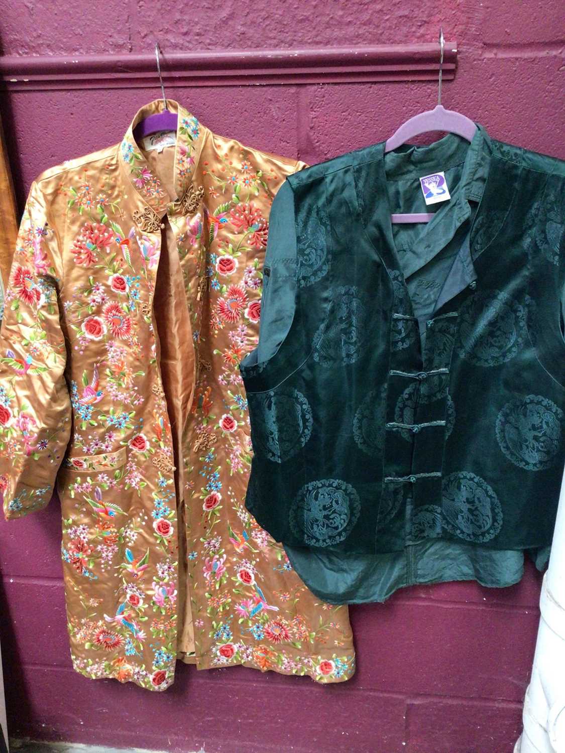 Two large suitcases containing mostly vintage and contemporary Chinese embroidered robes, jackets et