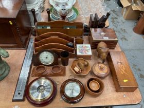 Group of treen items to include letter racks, barometers and sundries.