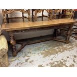 1920's/30's oak extending refectory table on turned and block legs joined by stretchers, 197.5cm x 9