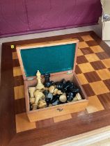 Turned wood chess set together with chess board
