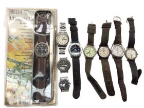 Group of military-style wristwatches