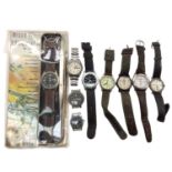 Group of military-style wristwatches