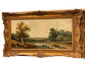 Pair of early 20th century oil on canvas landscape scenes, 28 x 57cm, in gilt frames,