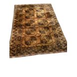 Eastern rug with ten medallions on rust brown ground, 212cm x 138cm