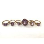 Six 9ct gold purple gem set dress rings