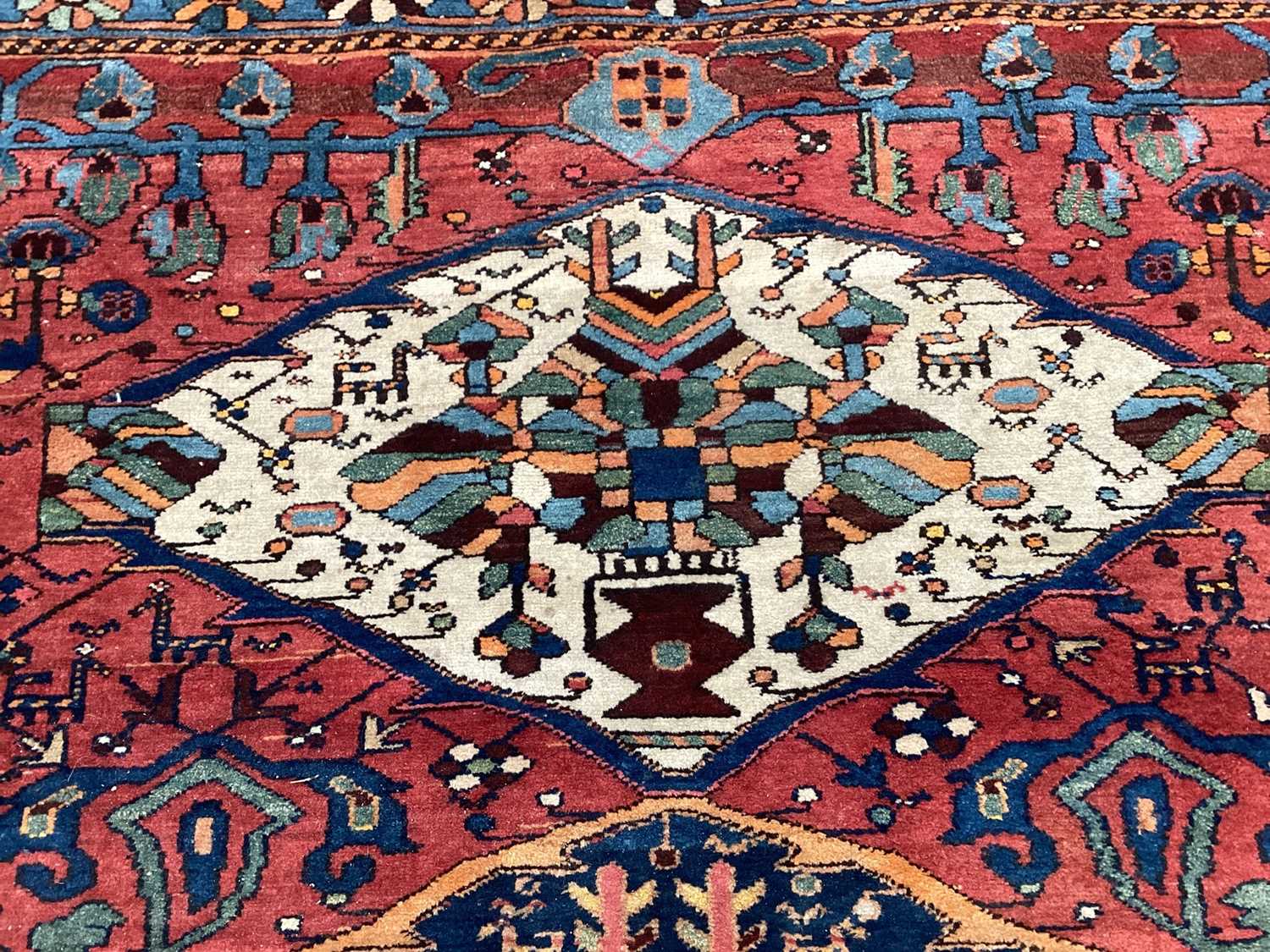 Eastern rug with three central medallions on red, blue, cream and green ground, 191cm x 148cm - Image 4 of 5