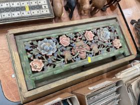 Chinese carved wood book stand with pierced polychrome painted decoration.