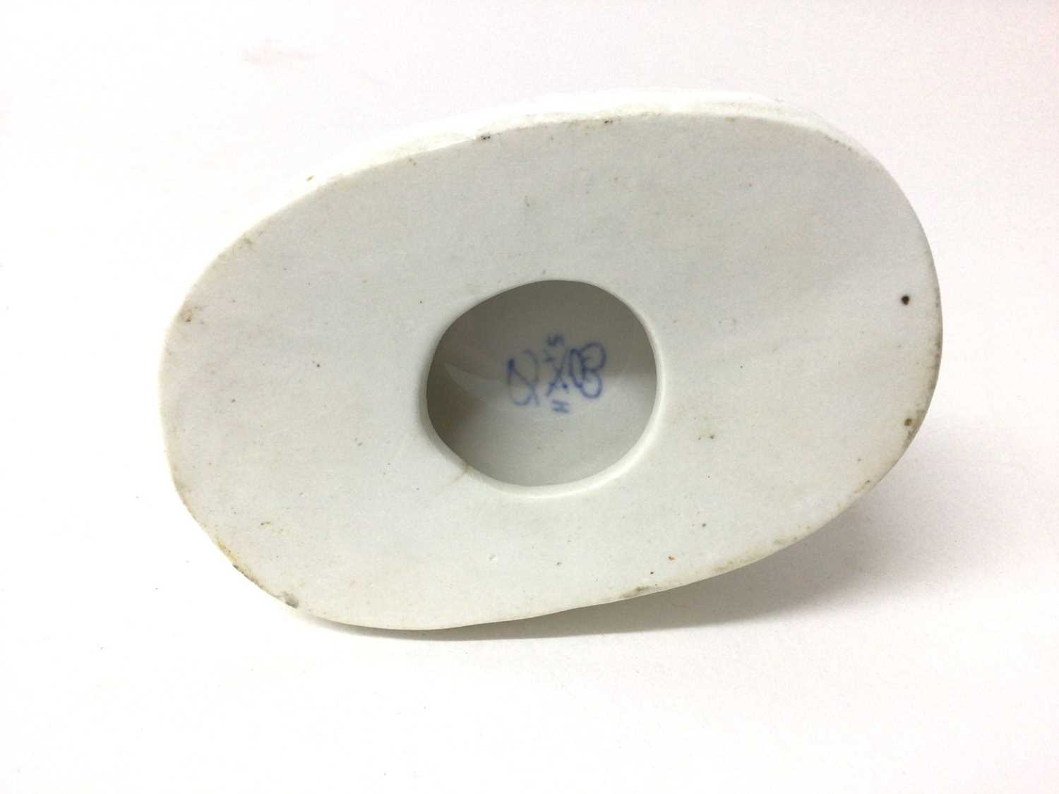 Derby Stephenson & Hancock white glazed model of a dog, shown seated on an oval base, inscribed mark - Image 3 of 3