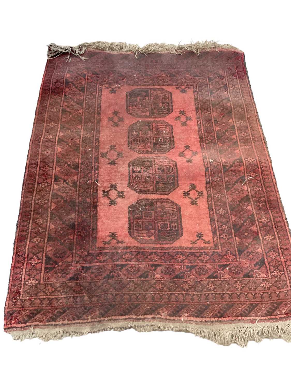 Eastern rug with four central medallions on red ground, 135cm x 102cm
