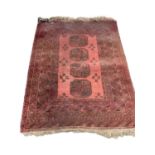 Eastern rug with four central medallions on red ground, 135cm x 102cm