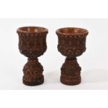 Pair of carved wood small cups