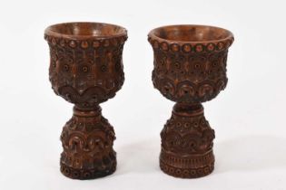 Pair of carved wood small cups