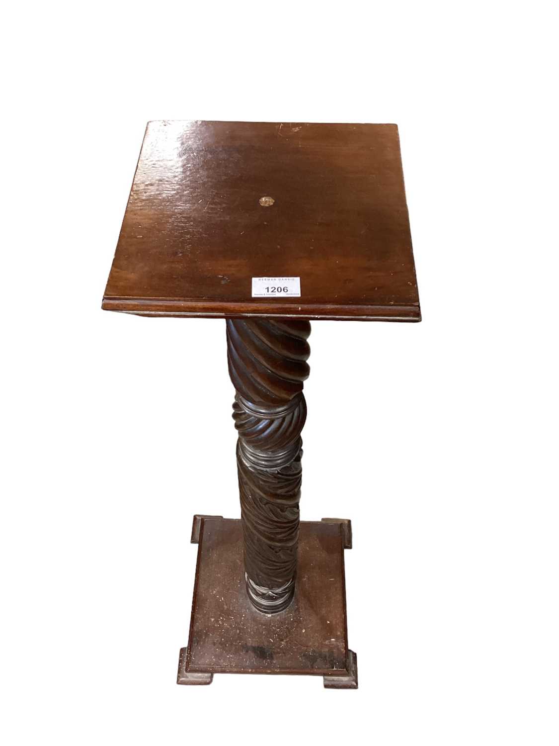 Victorian carved mahogany bedpost utilised as a torchere, with sqaure top and base