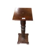 Victorian carved mahogany bedpost utilised as a torchere, with sqaure top and base