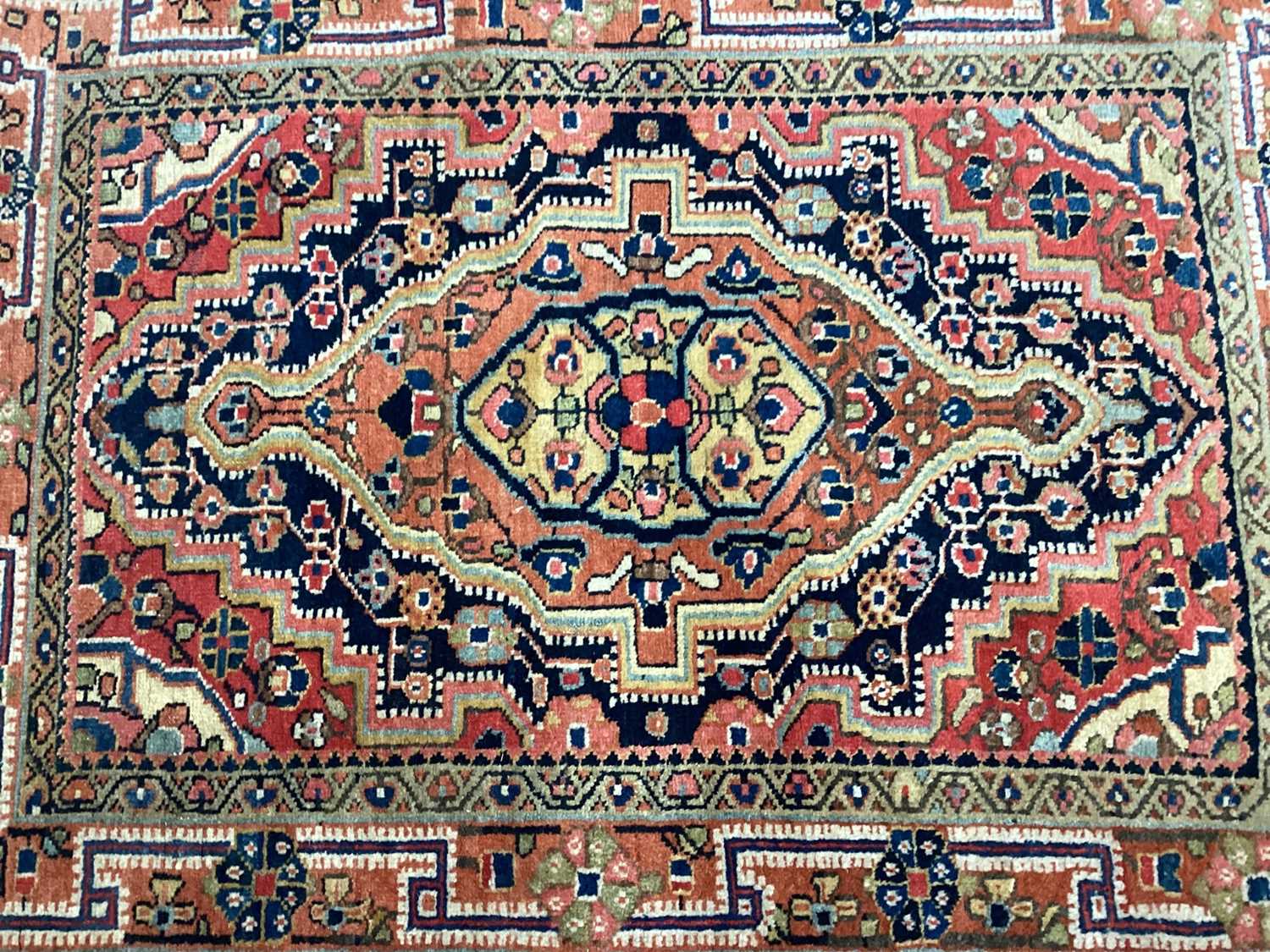 Eastern rug with geometric decoration on red, orange, blue and green ground, 97cm x 73cm - Image 2 of 3