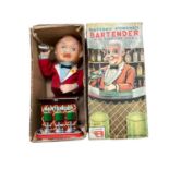 Rosko Battery operated Bartender with revolving eyes, in original box, plus a Cragstan Crapshooter b