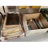 Two boxes of assorted ephemera to include photographs and maps.