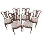 Set of six Edwardian carved walnut salon chairs upholstered in Romo fabric