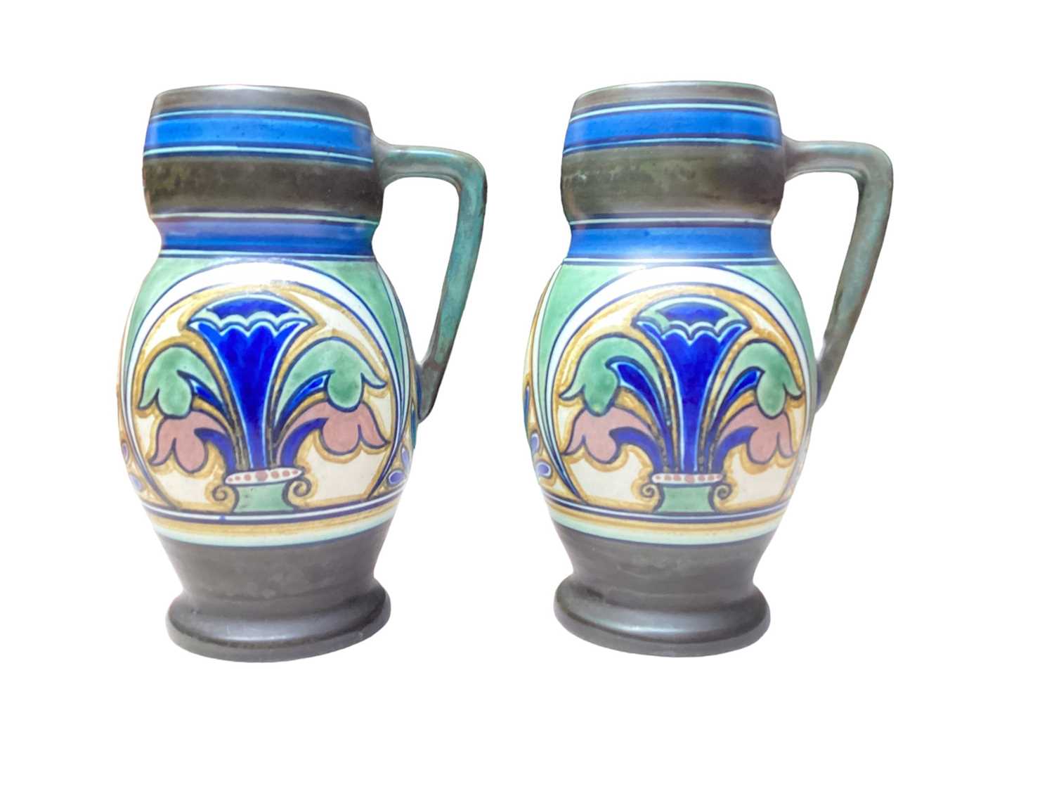 Pair of Gouda pottery ewers