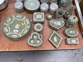 Group of green Wedgwood Jasperware dishes, trinket boxes and other items.