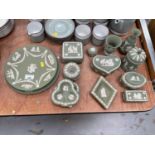 Group of green Wedgwood Jasperware dishes, trinket boxes and other items.