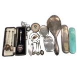 Silver backed dressing table brushes, silver teaspoon in fitted case, other silver and white metal f