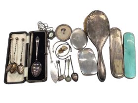 Silver backed dressing table brushes, silver teaspoon in fitted case, other silver and white metal f