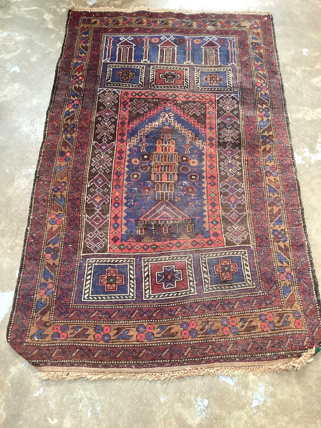 Eastern rug decorated with buildings on red, blue and brown ground, 128cm x 80cm - Image 4 of 4