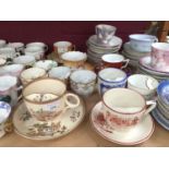 Large collection of moustache cups and saucers
