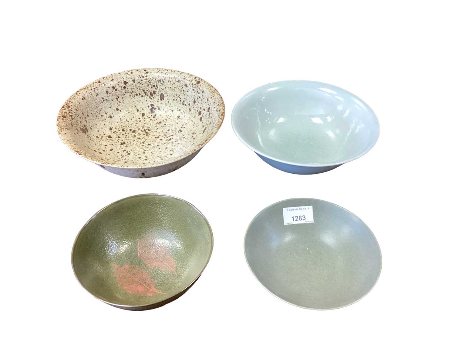 Yeap Poh Chap (1927-2007) four bowls to include a celadon glazed bowl, all signed, the largest 24cm