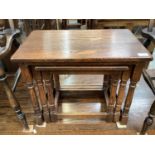 Oak nest of three occasional tables, together with a hanging cabinet (2)