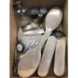 Silver backed dressing table items, silver teaspoons, silver buckle bangle, silver cased fob watch,