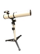 Amateur astronomer telescope on tripod