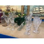 Group of antique glassware including two glasses with air twist stems, decanters etc