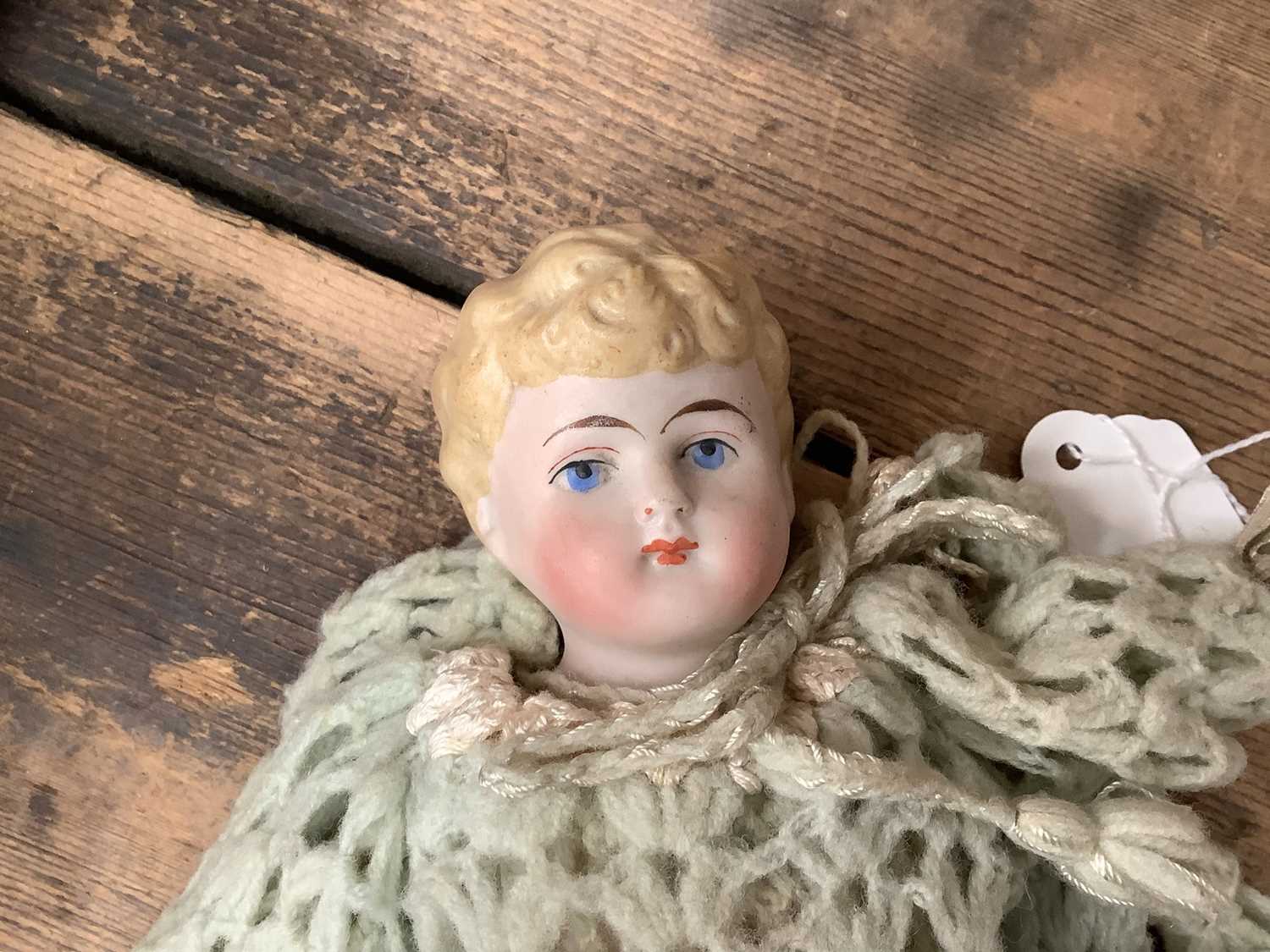 Victorian China head and shoulder doll marked 1222 3/0, with moulded blonde curly hair, painted fea - Image 2 of 3
