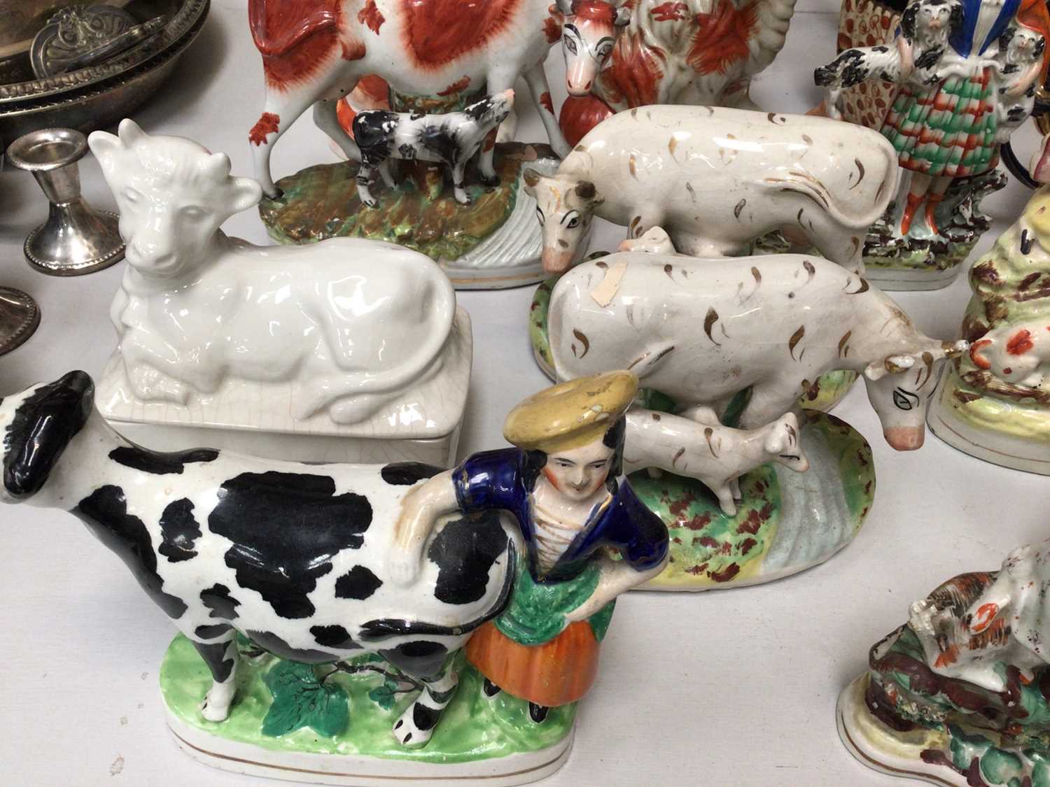 Collection of 19th century Staffordshire pottery to include spaniel, Toby jugs, cows and figures tog - Image 3 of 4