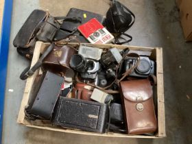 Box of vintage cameras including Kodak