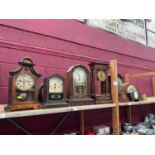 Group of mostly antique clocks, including German, American, one four-pillared, etc