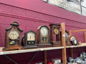 Group of mostly antique clocks, including German, American, one four-pillared, etc