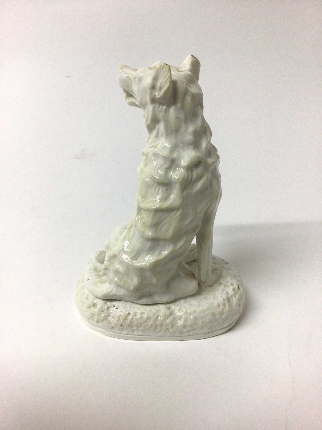 Derby Stephenson & Hancock white glazed model of a dog, shown seated on an oval base, inscribed mark - Image 2 of 3