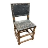 19th century Continental fruitwood side chair with studded leather seat and back