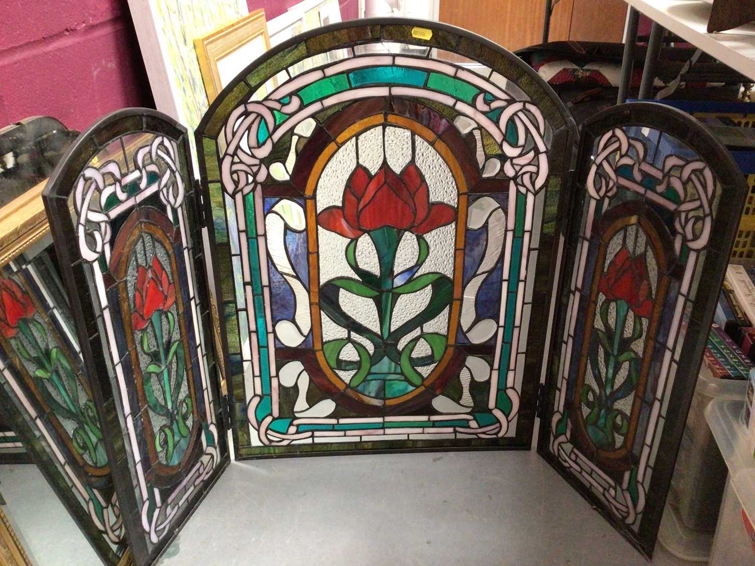 Stained glass triptych fire screen, gilt framed wall mirror and two other mirrors (4)