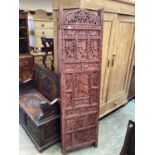 20th century Burmese hardwood screen with pierced decoration.