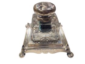 Large silver mounted glass inkwell on silver stand