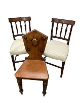 Pair of Regency mahogany side chairs and a Victorian oak hall chair