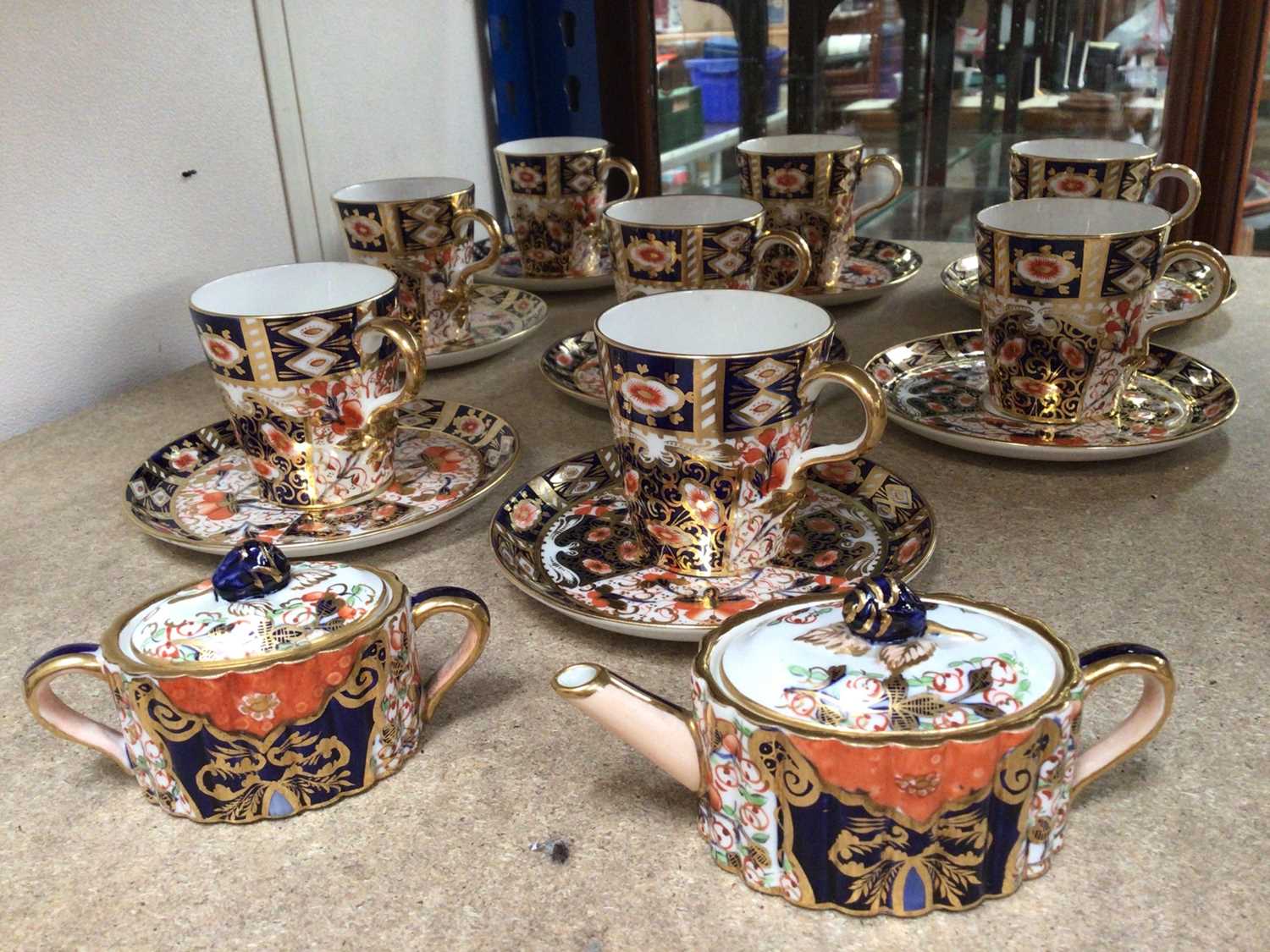 Davenport Imari eight place coffee set, together with an Imari miniature teapot and sugar pot