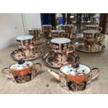 Davenport Imari eight place coffee set, together with an Imari miniature teapot and sugar pot